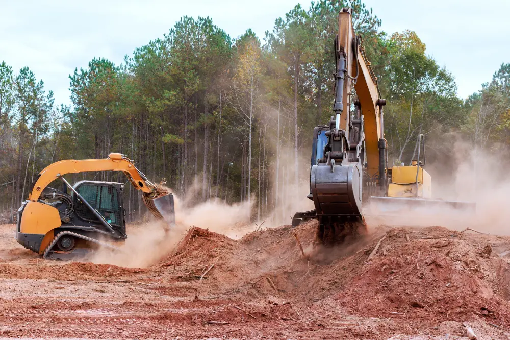 2 machines land clearing